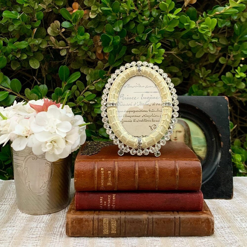 Jay Strongwater opalescent white oval frame with brilliant Swarovski chrystals